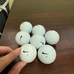 7 White Nike Golf Balls